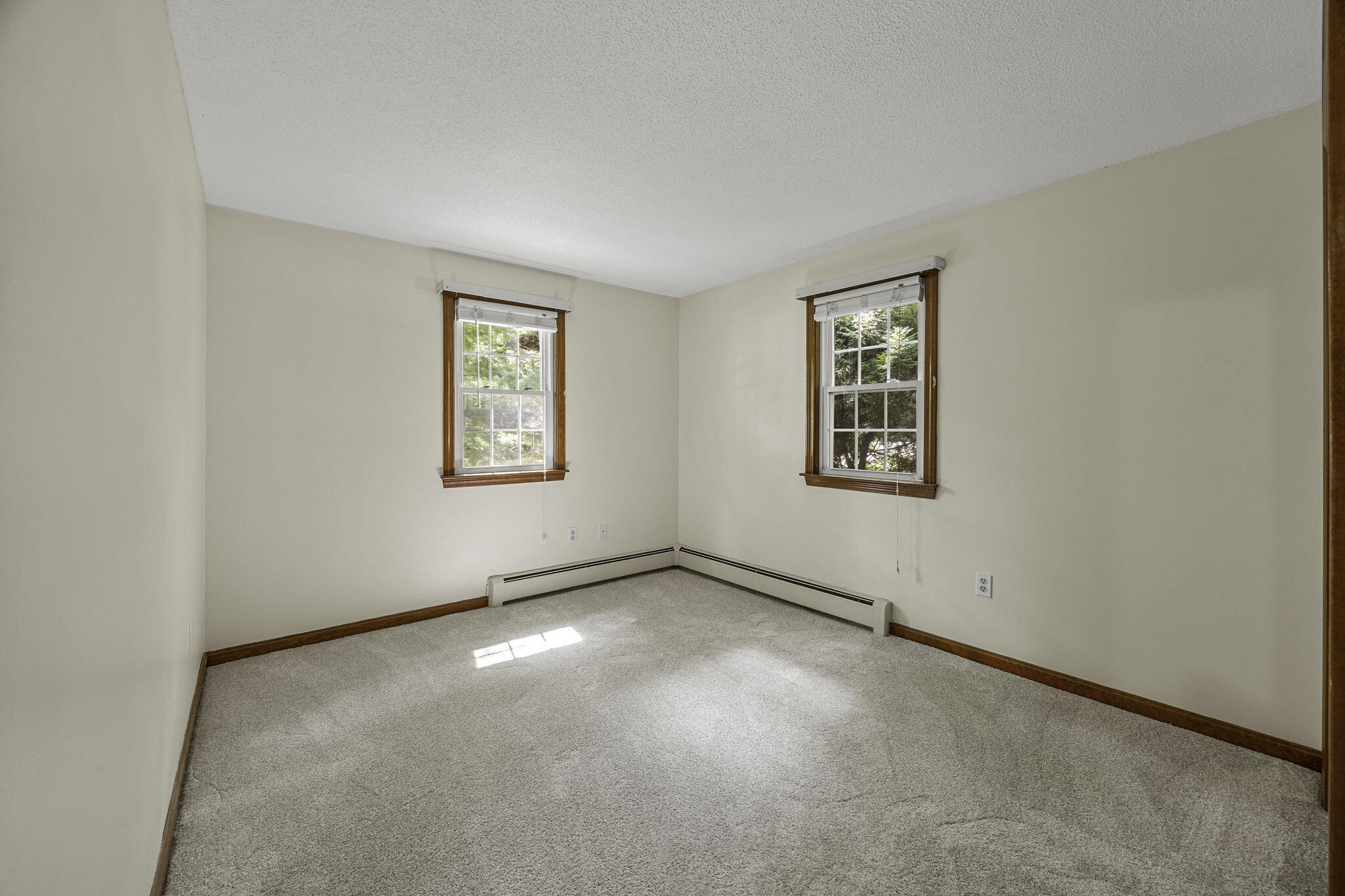 5 Carl Gardner Road Monument Beach, MA 02532 - Photo 19 of 29 an empty room with windows