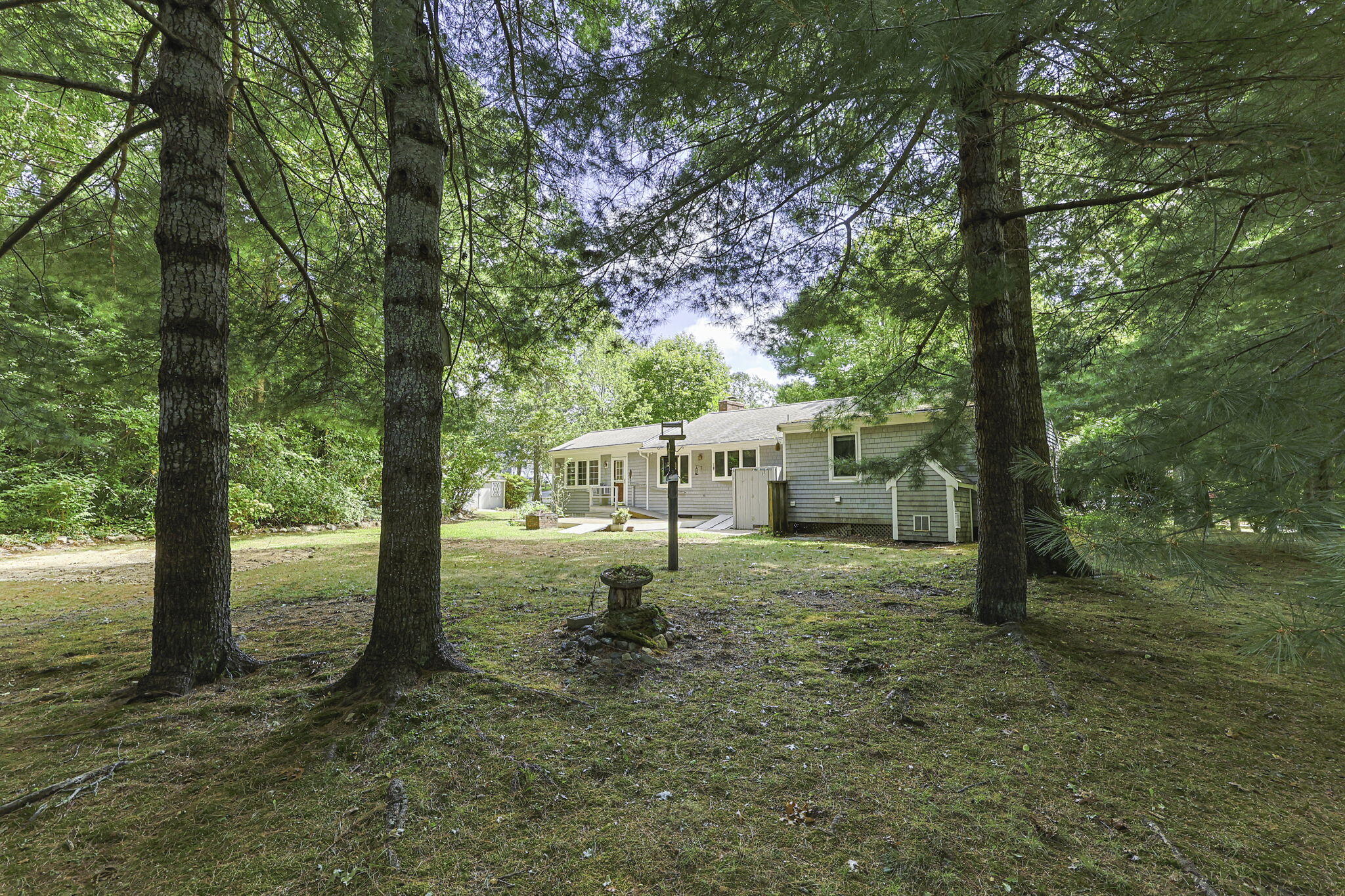 5 Carl Gardner Road Monument Beach, MA 02532 - Photo 25 of 29 a view of a house with a yard