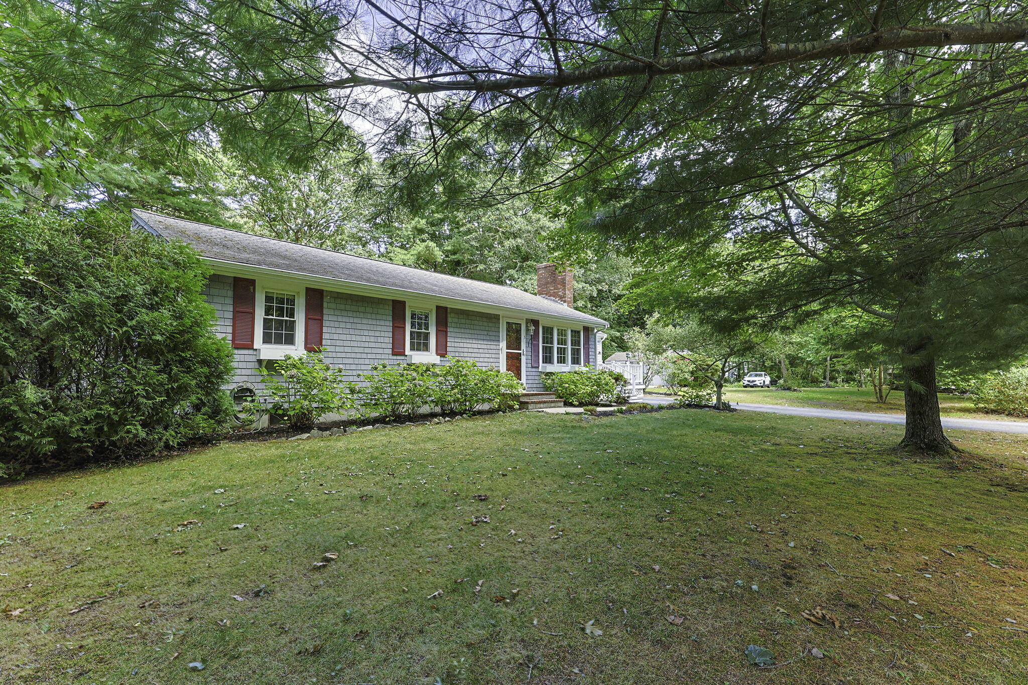 5 Carl Gardner Road Monument Beach, MA 02532 - Photo 27 of 29 a house view with a garden space