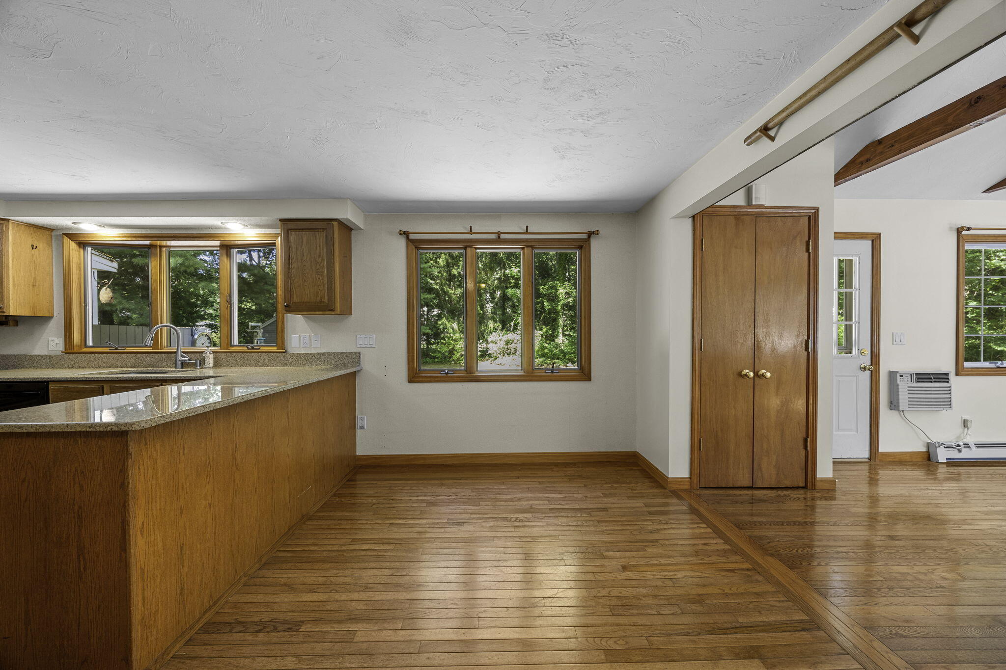 5 Carl Gardner Road Monument Beach, MA 02532 - Photo 8 of 29 a view of an empty room with window and wooden floor