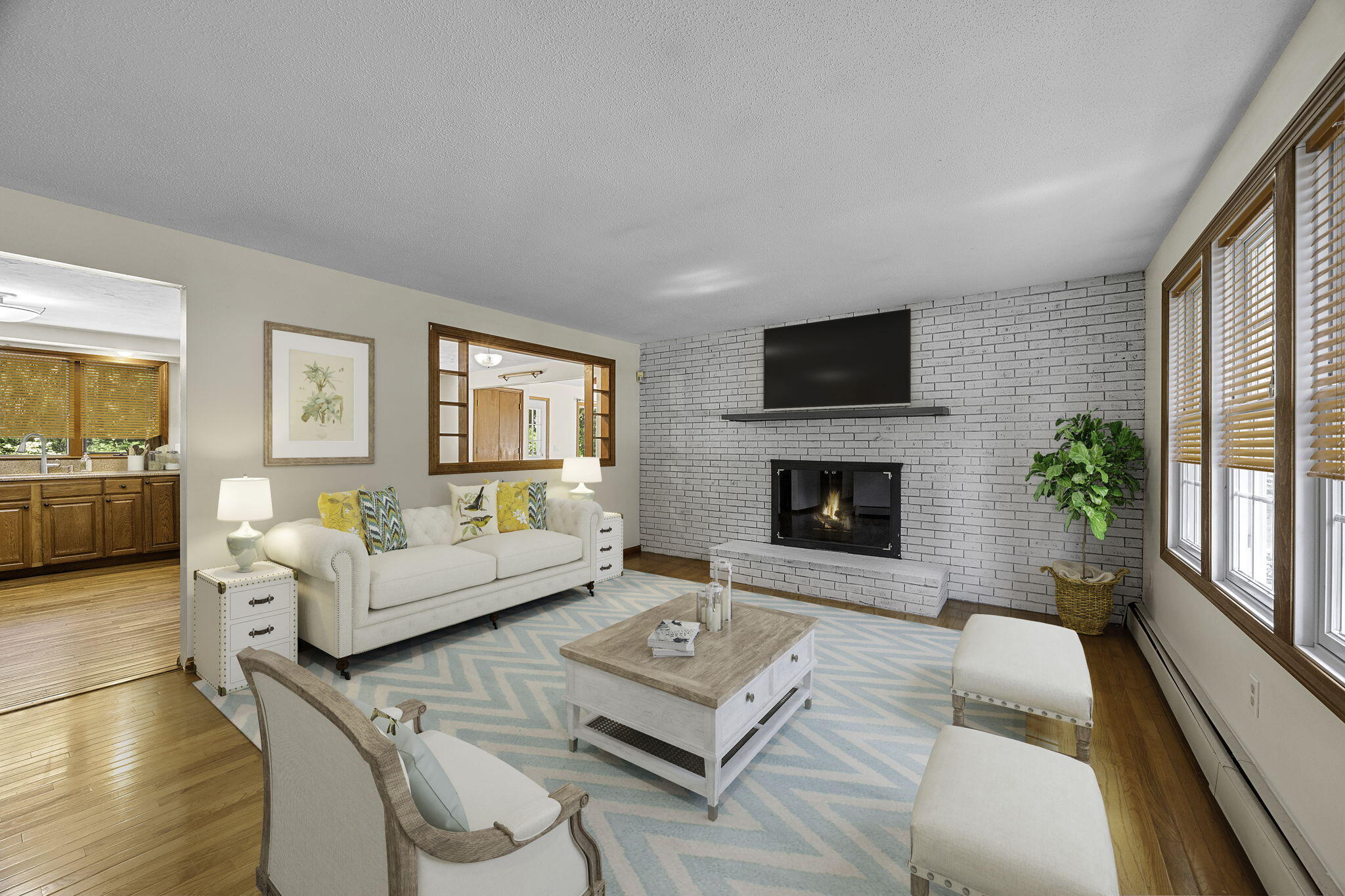 5 Carl Gardner Road Monument Beach, MA 02532 - Photo 10 of 29 a living room with furniture a flat screen tv and a fireplace