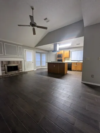 a view of a livingroom with natural light