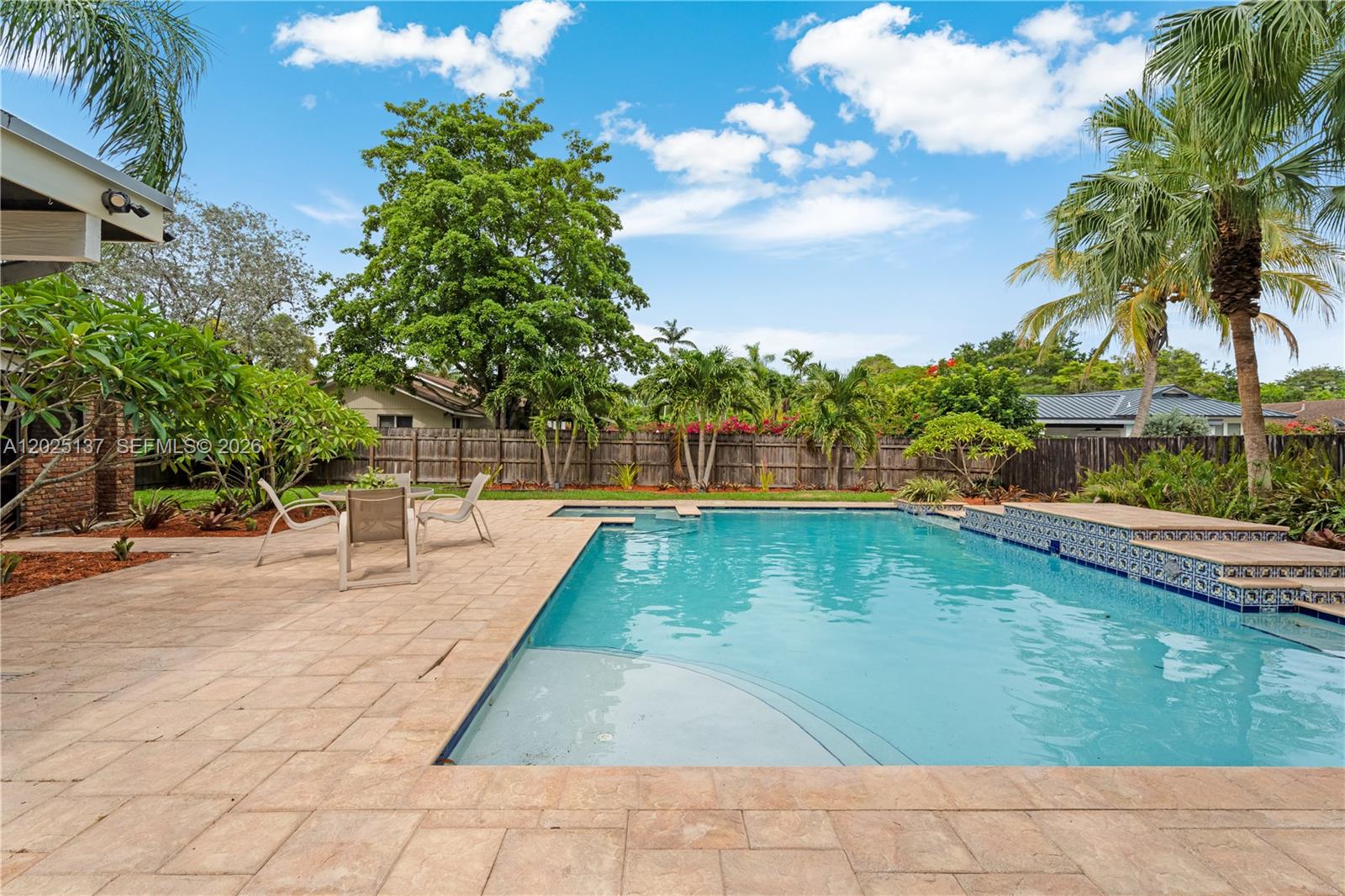11480 Southwest 96th Terrace Miami, FL 33176 - Photo 53 of 54 a view of swimming pool with sitting area and garden
