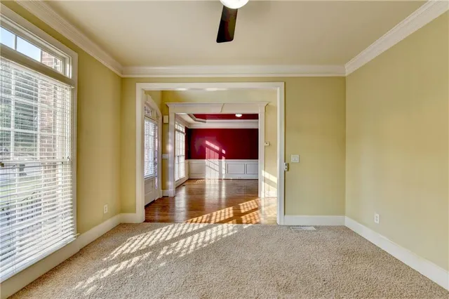 a kitchen with stainless steel appliances granite countertop wooden cabinets a sink and dishwasher