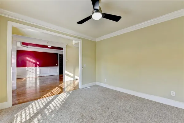 a kitchen with stainless steel appliances granite countertop stove top oven and cabinets