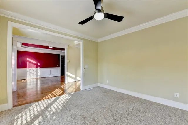 a kitchen with stainless steel appliances granite countertop stove top oven and cabinets