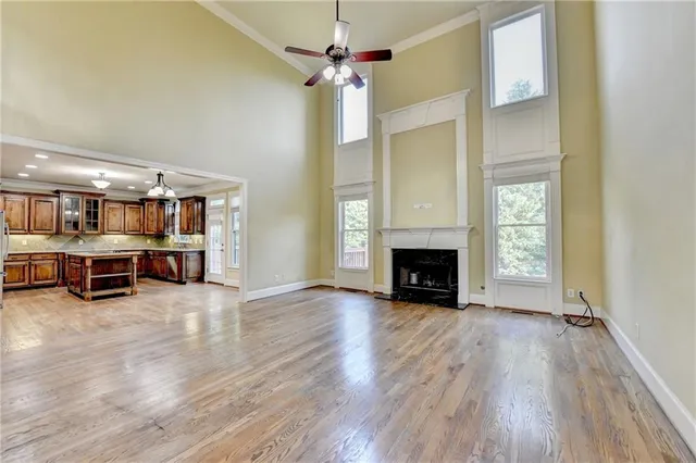 a kitchen with stainless steel appliances granite countertop a sink and a refrigerator