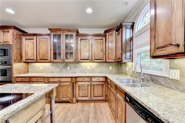 a view of a livingroom with a chandelier fan