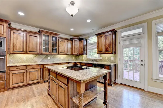 a view of an empty room with a fireplace