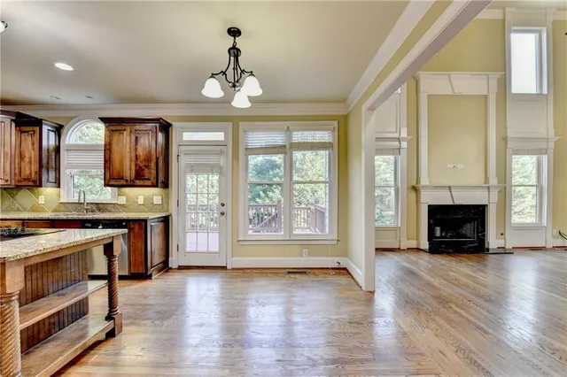 a bathroom with a double vanity sink a mirror and a shower