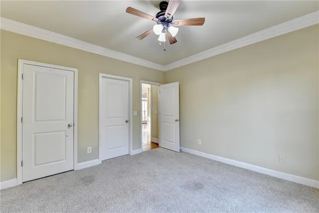 a view of balcony with wooden floor and fence