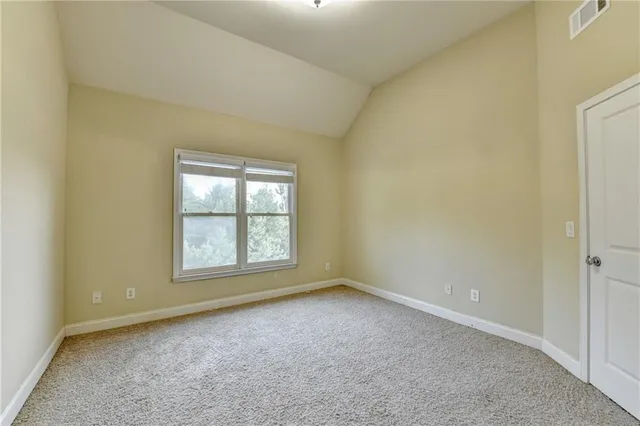 an aerial view of residential house with outdoor space and swimming pool