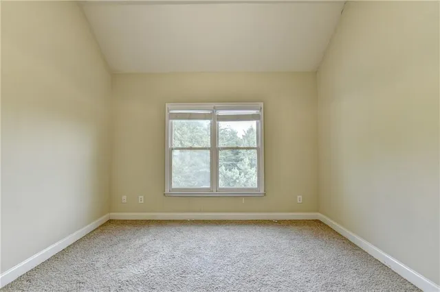 an aerial view of house with yard
