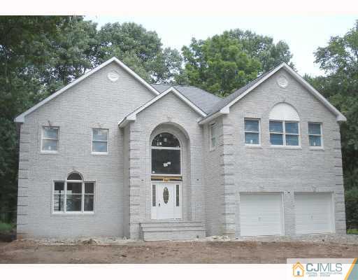 30 Hillsdale Road Edison, NJ 08820 - Photo 1 of 6 a front view of a house with a yard