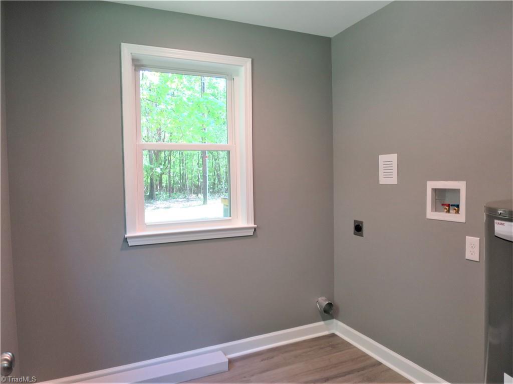 116 Spillman Road Mocksville, NC 27028 - Photo 17 of 32 Large Laundry Room with extra Storage Possibilities!