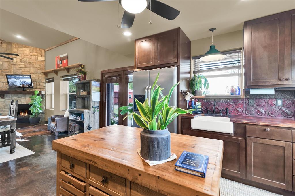 8665 Cr-669 Blue Ridge Blue Ridge, TX 75424 - Photo 16 of 39 a kitchen with a table and chairs in it