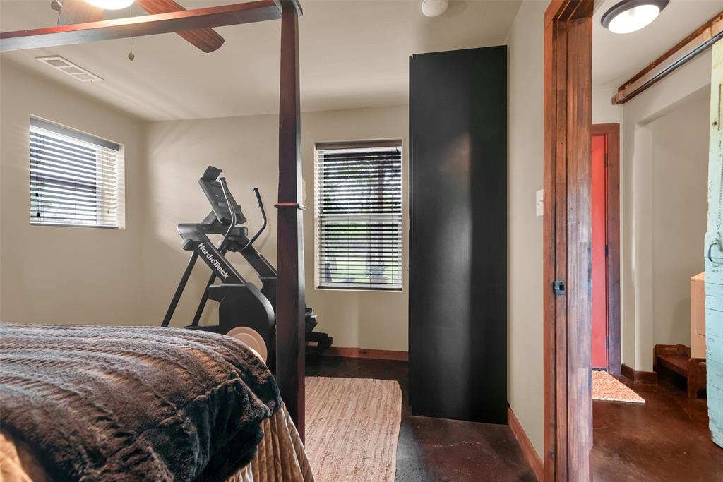 8665 Cr-669 Blue Ridge Blue Ridge, TX 75424 - Photo 20 of 39 a bed room with a bed and a window