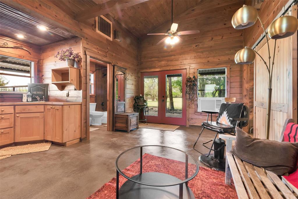 8665 Cr-669 Blue Ridge Blue Ridge, TX 75424 - Photo 26 of 39 a living room with furniture and a large window