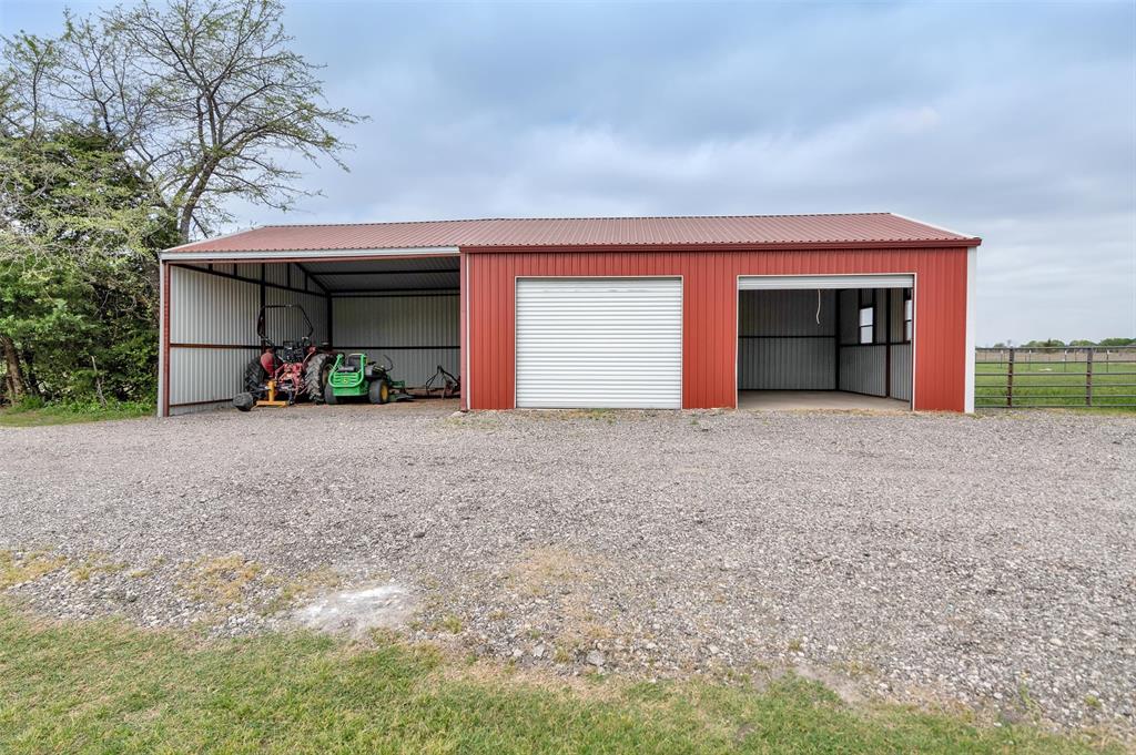 8665 Cr-669 Blue Ridge Blue Ridge, TX 75424 - Photo 35 of 39 a view of a house with a yard and garage