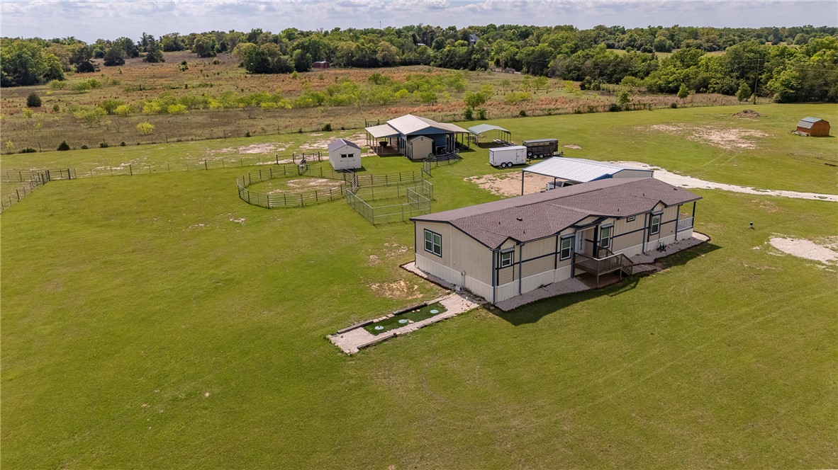 10976 Whiterock Road Bremond, TX 76629 - Photo 2 of 42 a view of a lake with a yard
