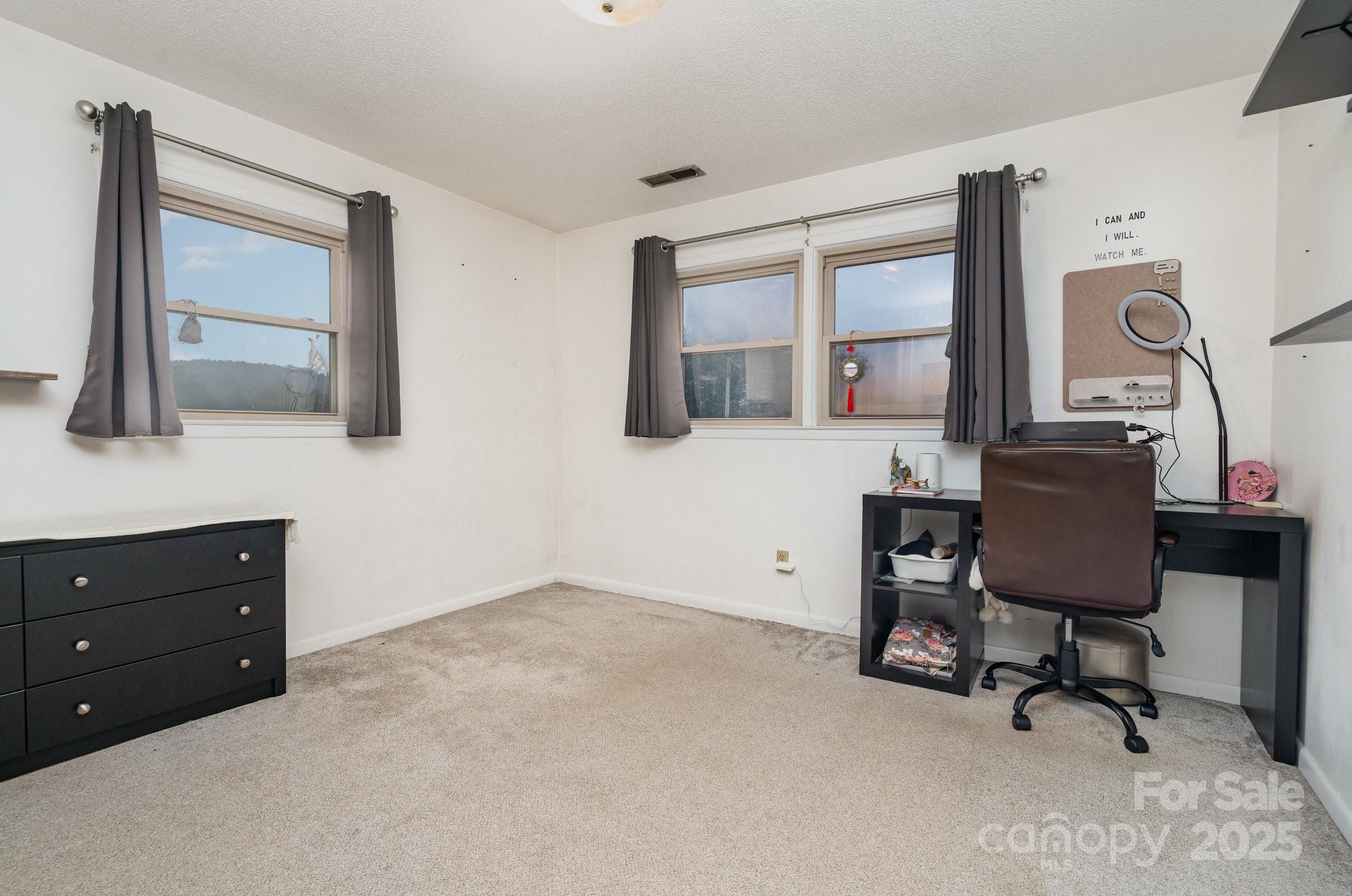 4458 Johnson Bridge Road Hickory, NC 28602 - Photo 19 of 31 a workspace with furniture