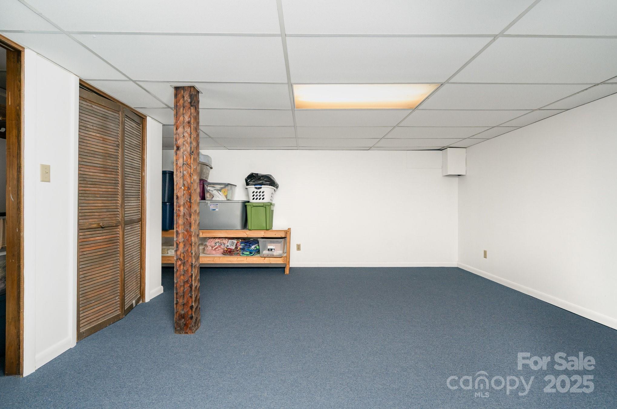 4458 Johnson Bridge Road Hickory, NC 28602 - Photo 22 of 31 a view of a room with gym equipment