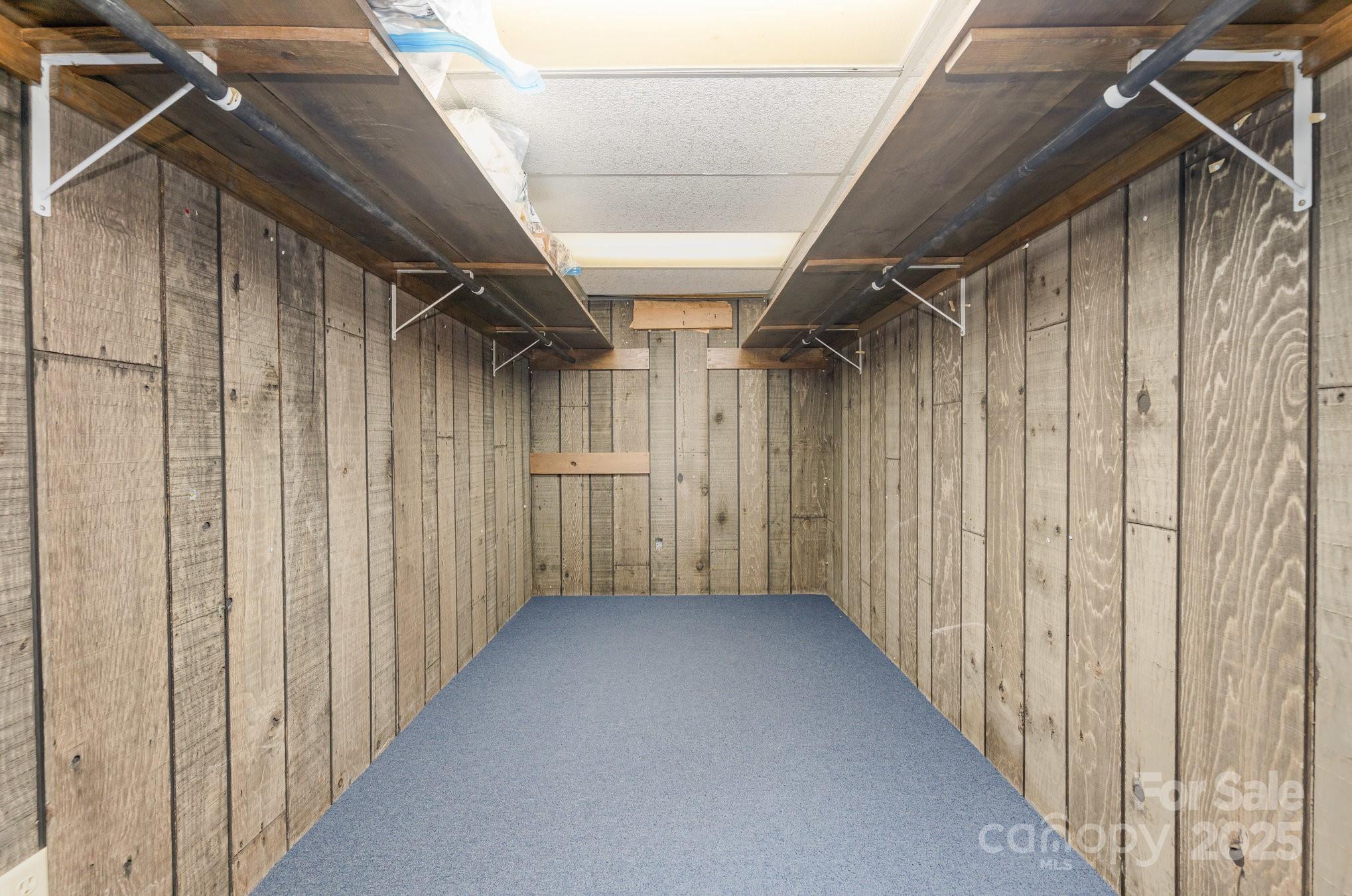 4458 Johnson Bridge Road Hickory, NC 28602 - Photo 23 of 31 a view of a room with wooden walls