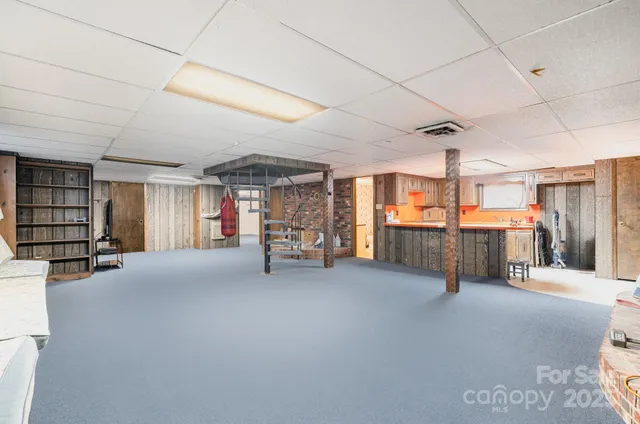 a view of a livingroom with furniture and window