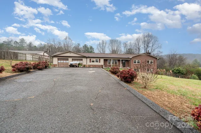 a view of residential houses with city view