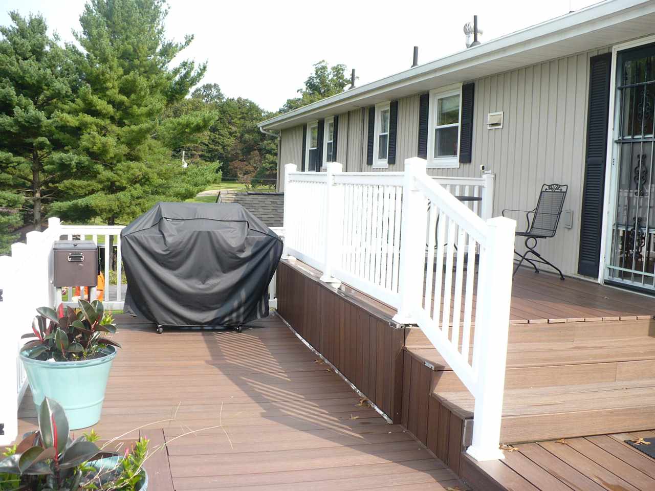961 Ladd Road Waynesboro, VA 22980 - Photo 20 of 30 a view of a chair and tables back yard of the house