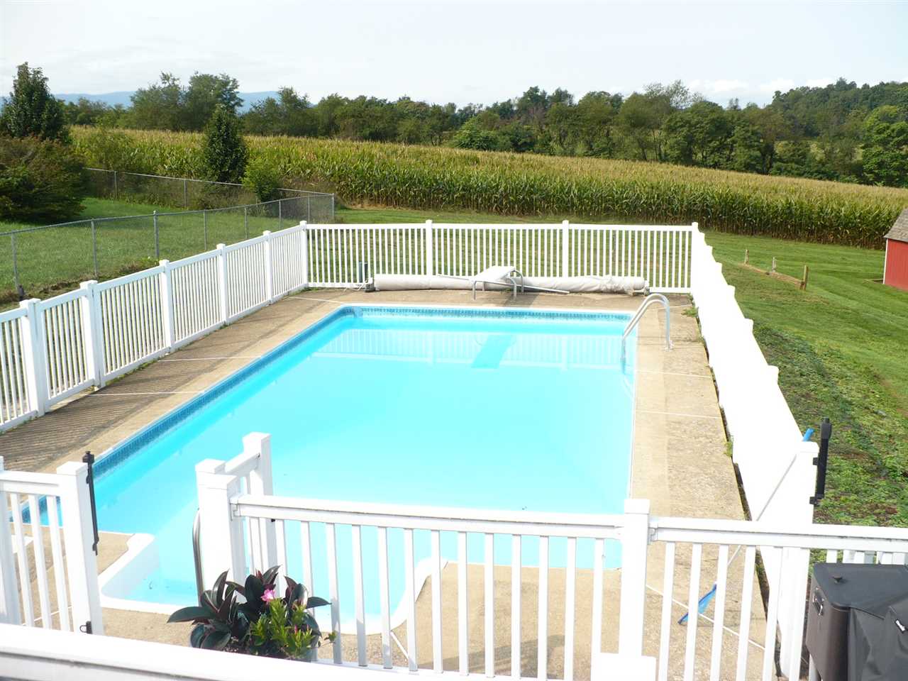961 Ladd Road Waynesboro, VA 22980 - Photo 23 of 30 a view of a lake with a deck