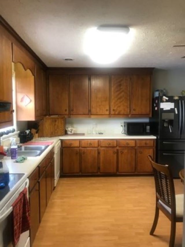 961 Ladd Road Waynesboro, VA 22980 - Photo 7 of 30 a kitchen with cabinets a sink and appliances
