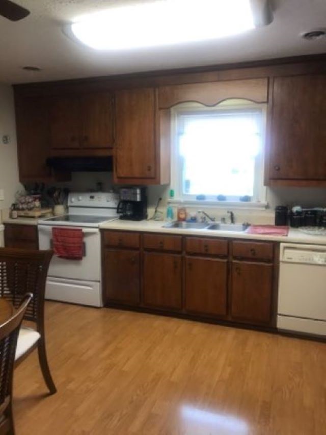 961 Ladd Road Waynesboro, VA 22980 - Photo 8 of 30 a kitchen with stainless steel appliances a sink a stove a microwave a center island and cabinets