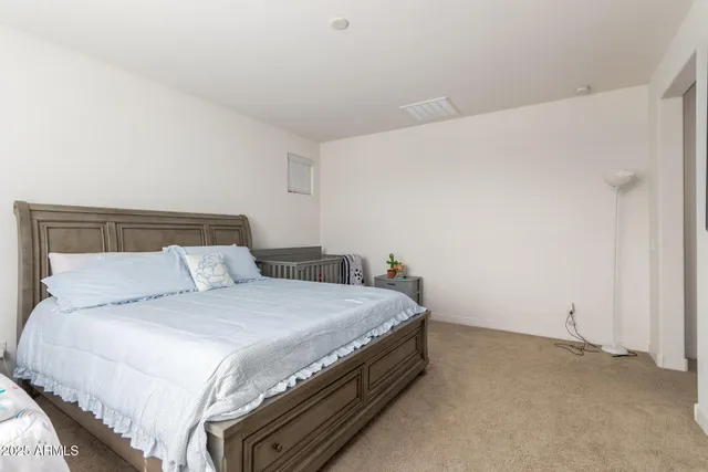 a bathroom with a sink a mirror and a shower