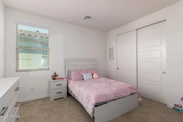 a room with gym equipment and a window