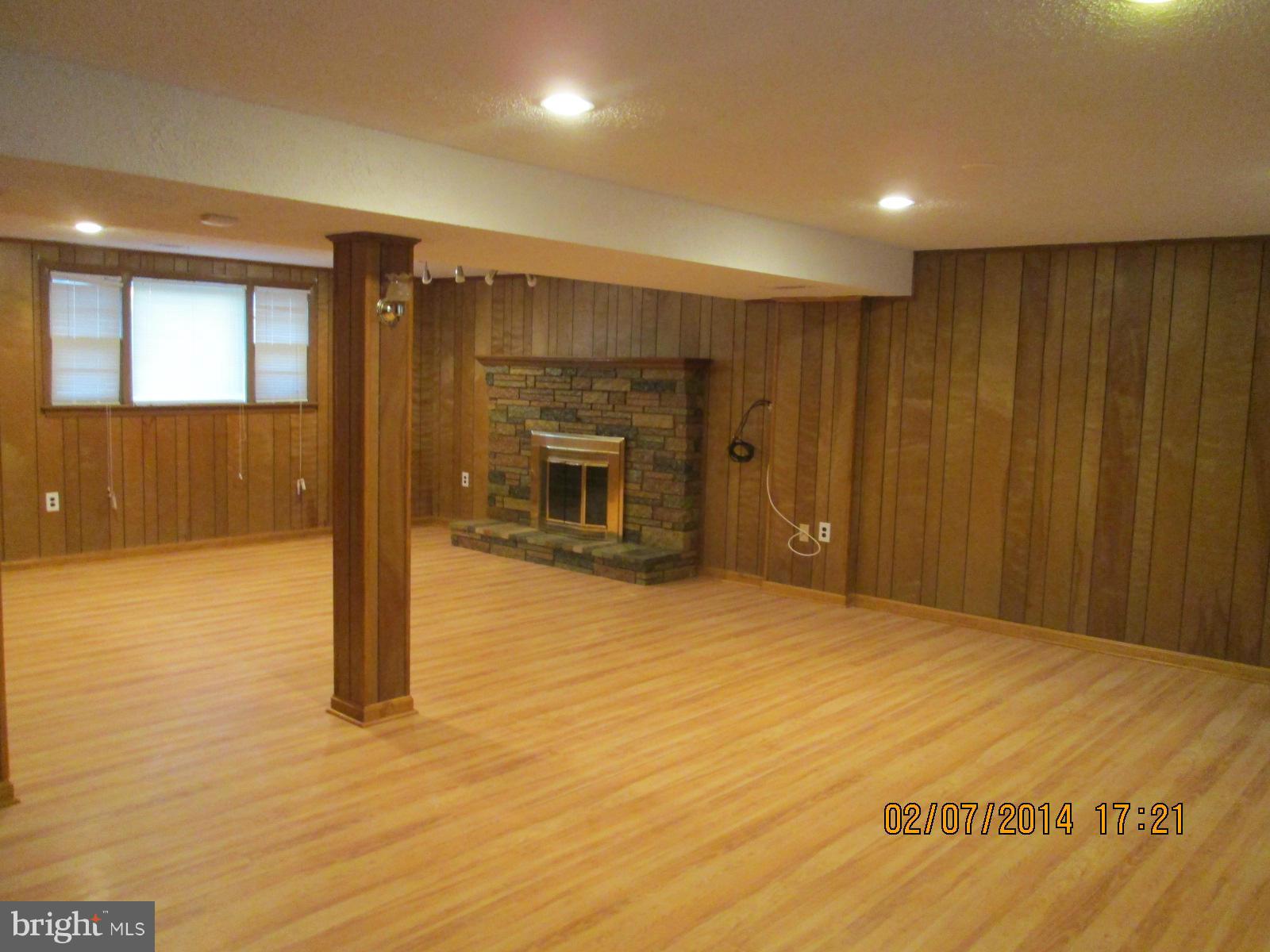 6610 Robinia Road Temple Hills, MD 20748 - Photo 22 of 30 Spacious Rec Room with Fireplace