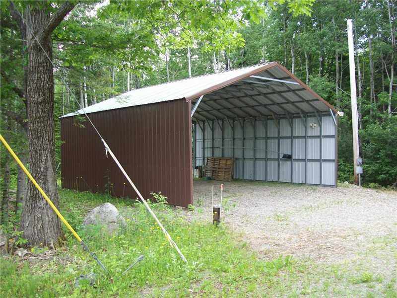 2633 Picloc Road Wytopitlock, ME 04497 - Photo 6 of 35 A closer view of the carport, room...