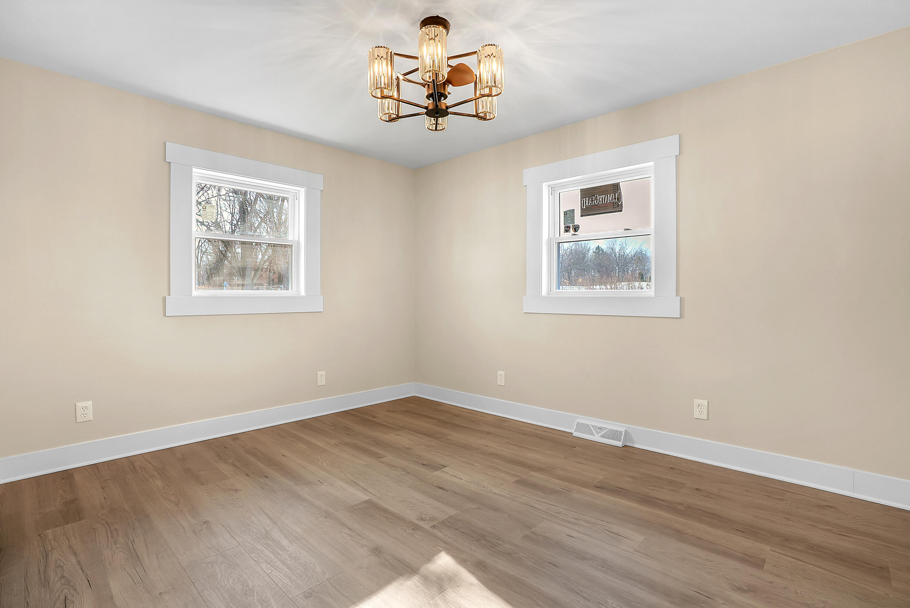 1952 Hayes Leonard Road Valparaiso, IN 46385 - Photo 18 of 42 a view of wooden floor chandelier and a chandelier fan in a room