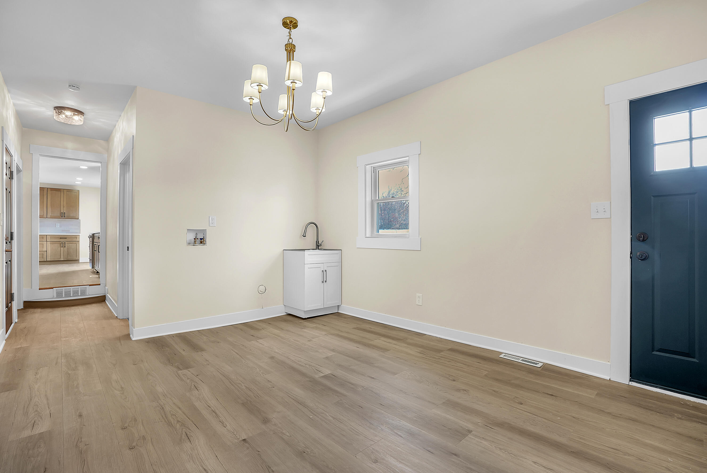 1952 Hayes Leonard Road Valparaiso, IN 46385 - Photo 22 of 42 wooden floor in an empty room with a window