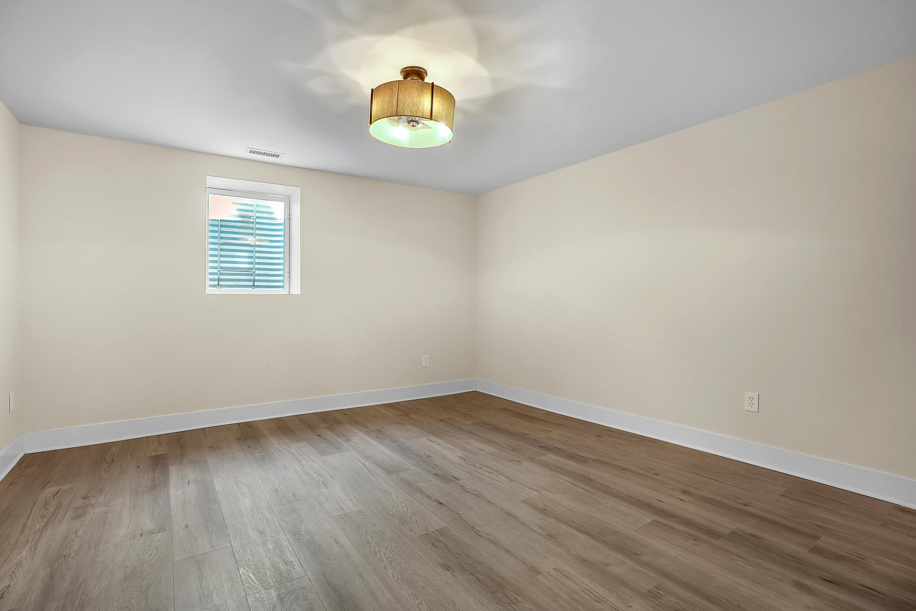 1952 Hayes Leonard Road Valparaiso, IN 46385 - Photo 29 of 42 an empty room with wooden floor and window