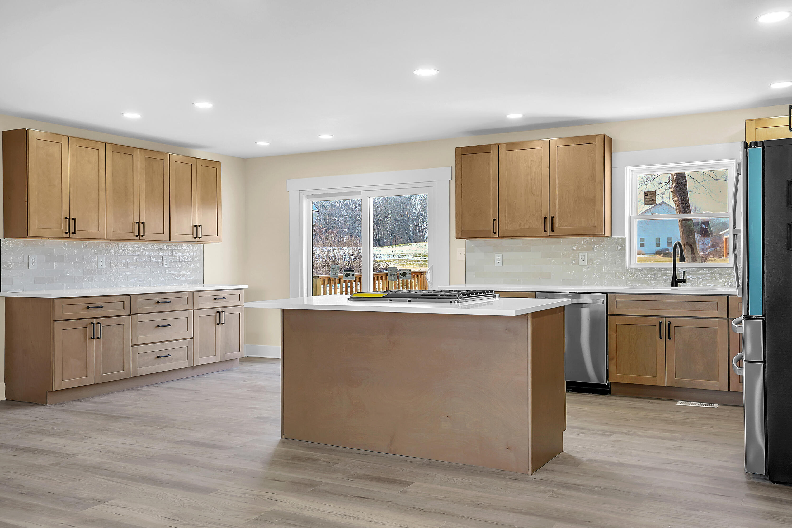 1952 Hayes Leonard Road Valparaiso, IN 46385 - Photo 7 of 42 a kitchen with sink a stove and cabinets