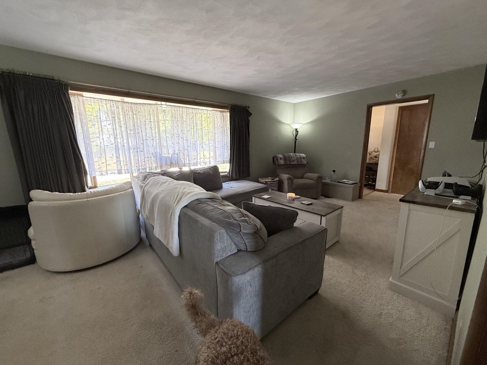 214 South Long Street Warren, IL 61087 - Photo 14 of 28 a living room with furniture and a flat screen tv