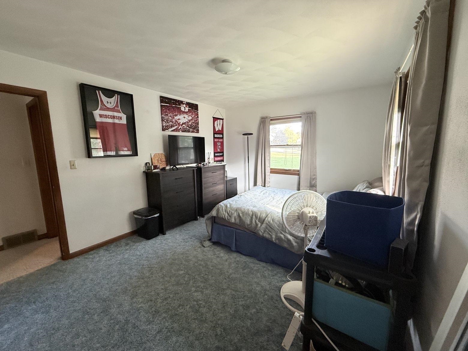 214 South Long Street Warren, IL 61087 - Photo 17 of 28 a bedroom with a bed and furniture