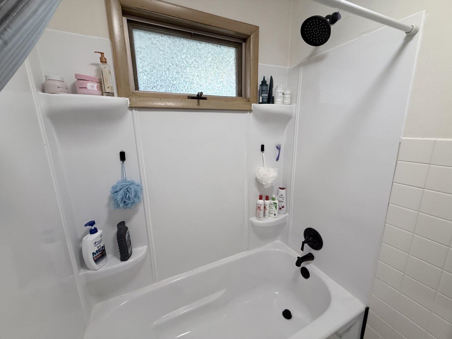 214 South Long Street Warren, IL 61087 - Photo 5 of 28 a bathroom with a bathtub and a sink