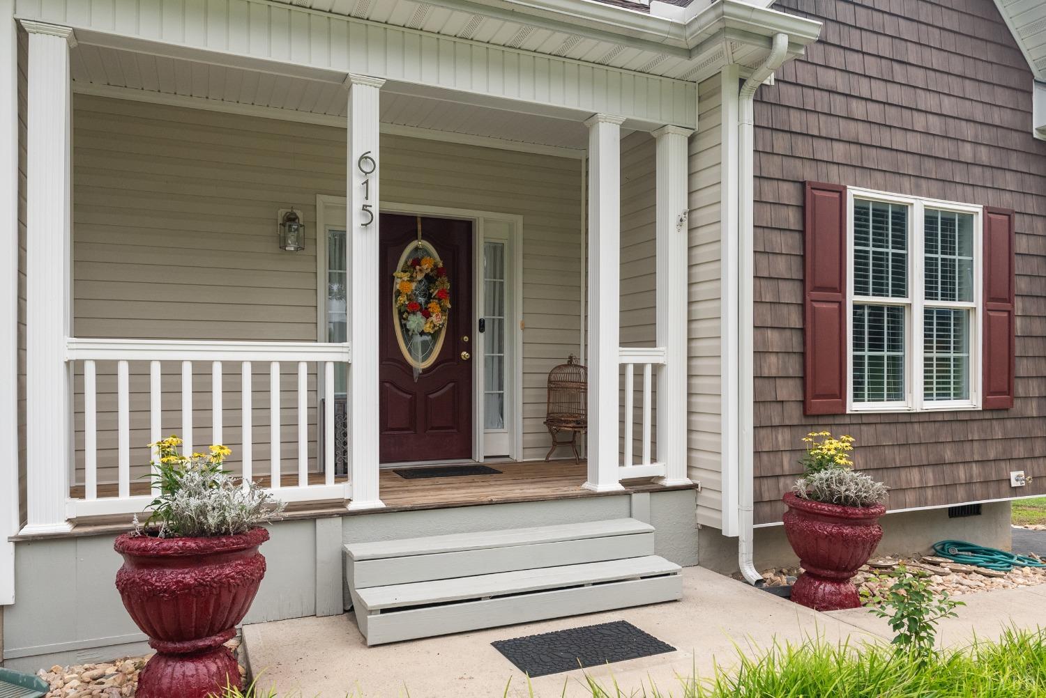 615 Spring Street Hurt, VA 24563 - Photo 2 of 63 a front view of a house with outdoor seating