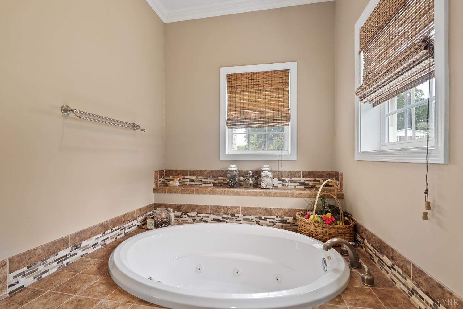615 Spring Street Hurt, VA 24563 - Photo 25 of 63 a bathroom with a sink and bathtub