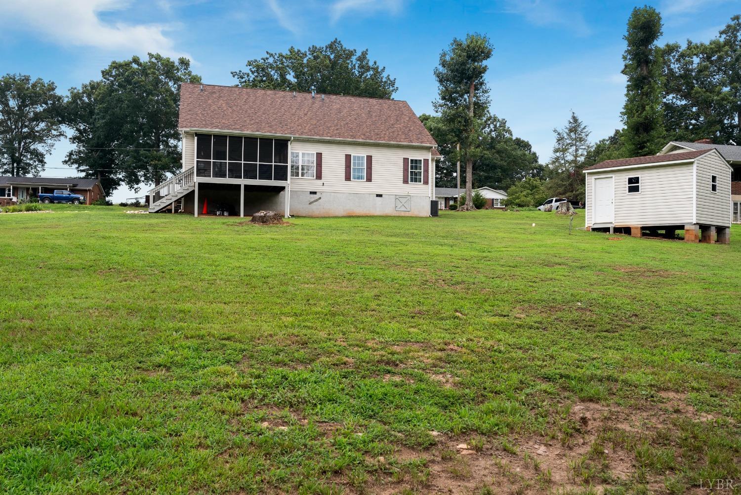 615 Spring Street Hurt, VA 24563 - Photo 50 of 63 a view of a house with a yard and sitting area