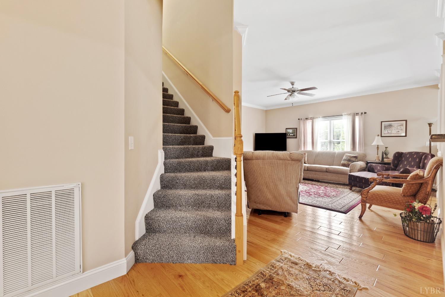 615 Spring Street Hurt, VA 24563 - Photo 7 of 63 a view of a livingroom with furniture and staircase