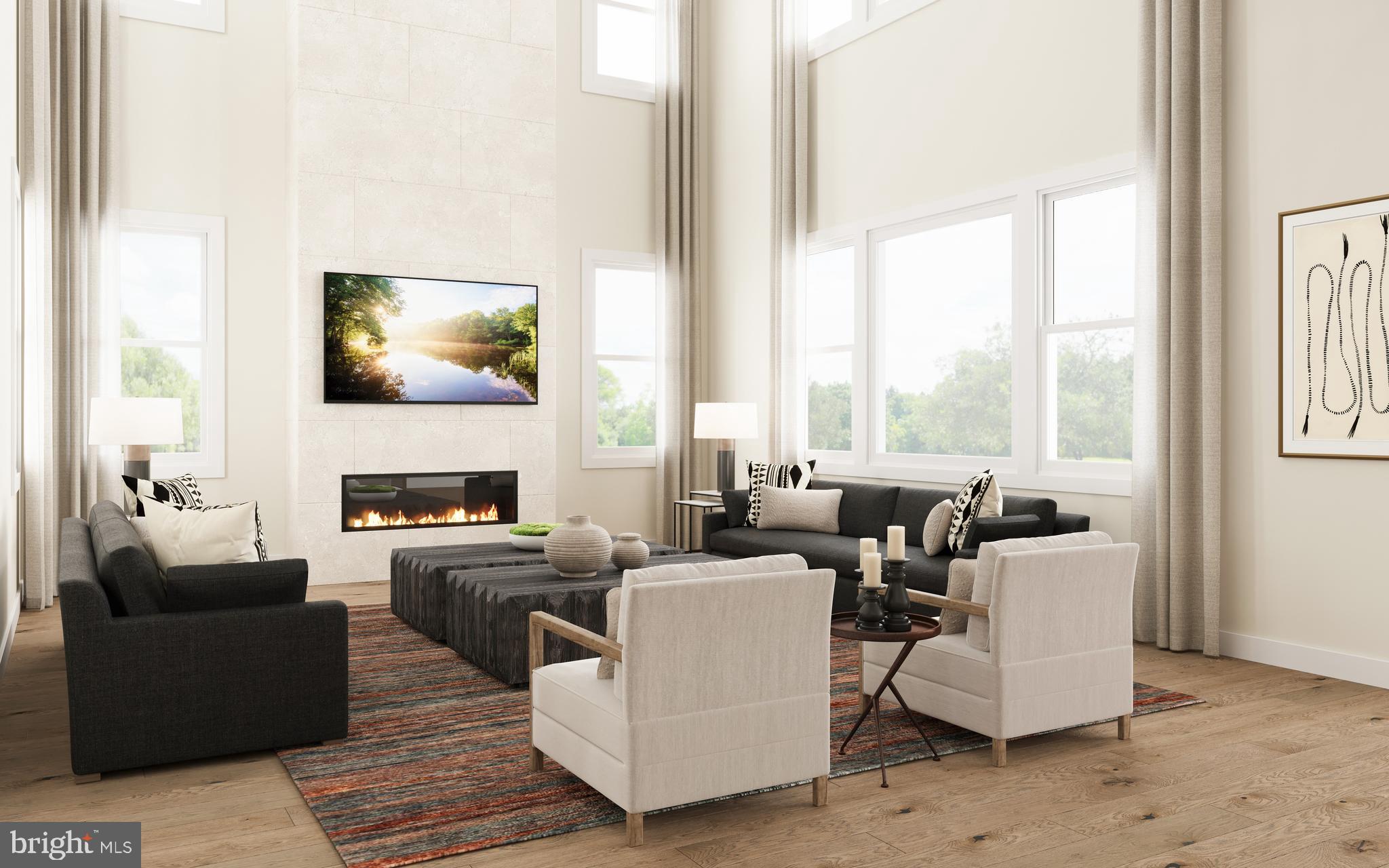 1489 Stony Road Warminster, PA 18974 - Photo 1 of 8 a living room with fireplace furniture and a flat screen tv