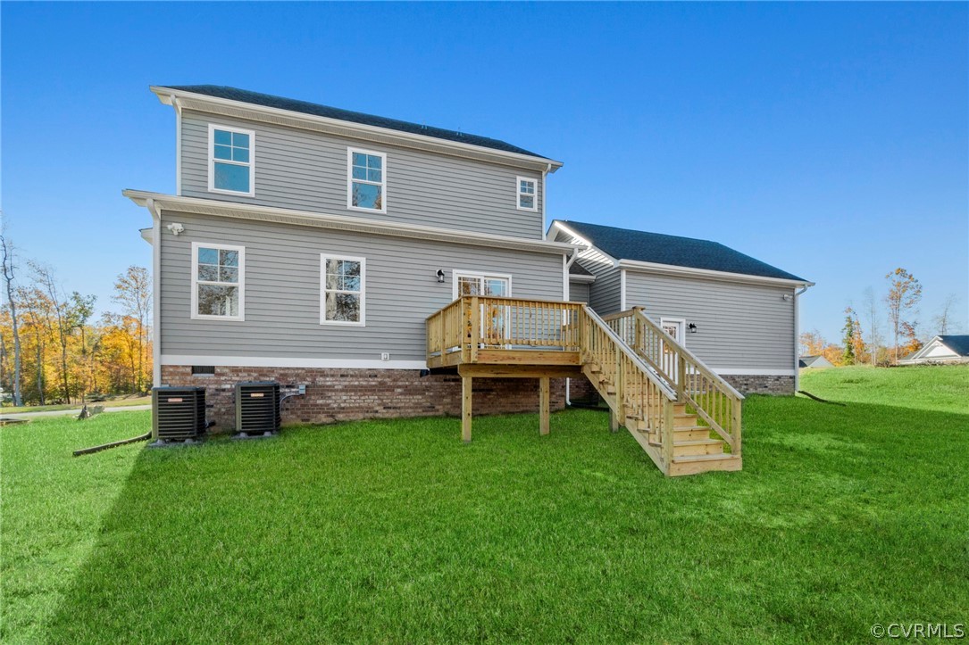 211 Edwin Circle Aylett, VA 23009 - Photo 12 of 48 a house view with a garden space